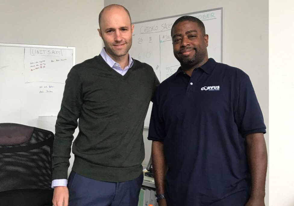 Corvus employee and Corvus Franchisee in office