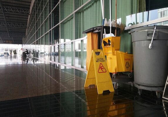 Image of yellow wet floor warning sign for cleaning safety guide