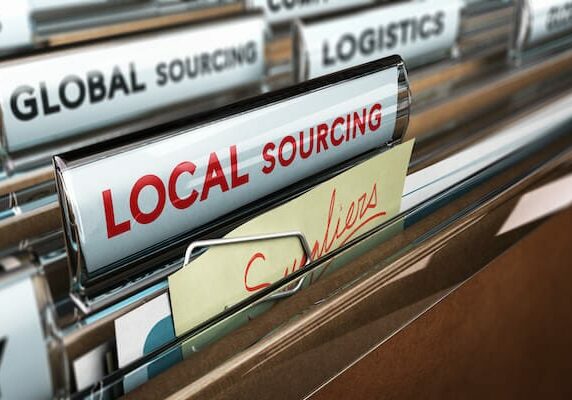 files in file cabinet with text reading "LOCAL SOURCING" and "Suppliers"
